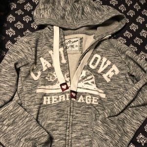 Cali Love zip up sweater.